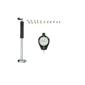 Professional 421 series dial bore gauge kit with self-centering bridge, interchangeable screw-type anvils, long extension handle, and 0.01mm dial indicator for engine cylinder and precision bore measurement.