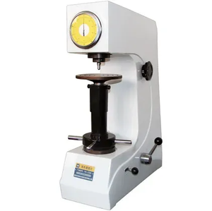 Professional electric Rockwell hardness tester with high-precision dial indicator, automated load mechanism, and sturdy bench top frame for HRC, HRB, and HRA metal hardness measurement.